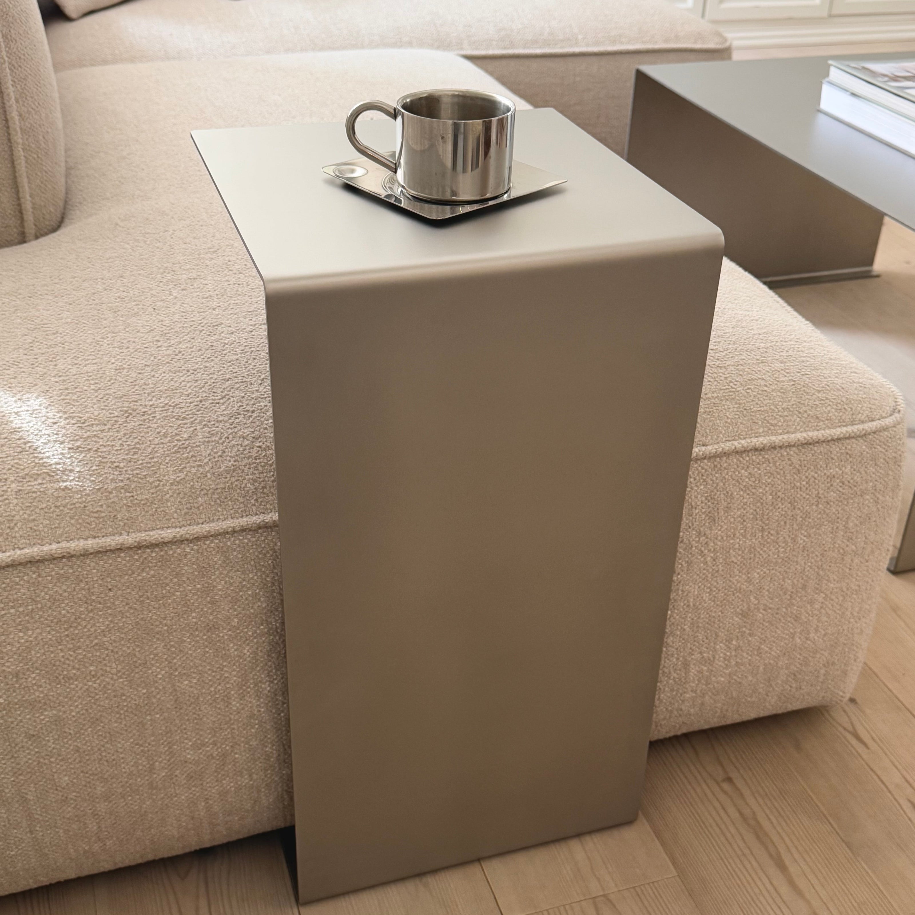 Front view of the Elegance Side Table in satin-matte stainless steel.